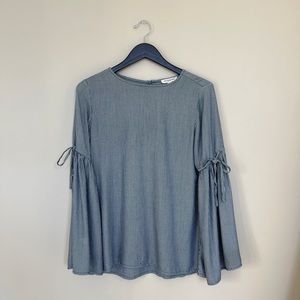 Long sleeve blue and white striped top